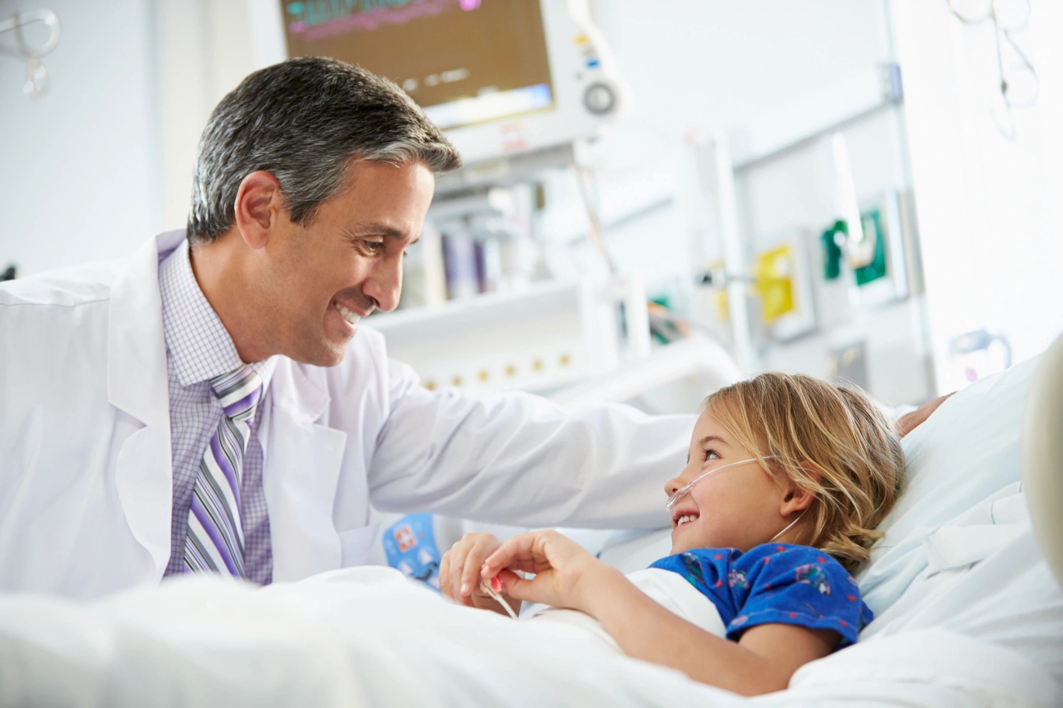 Pediatric doctor with child patient