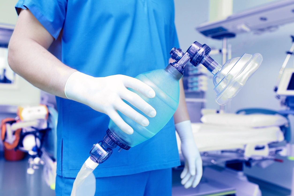 Healthcare professional with breathing apparatus